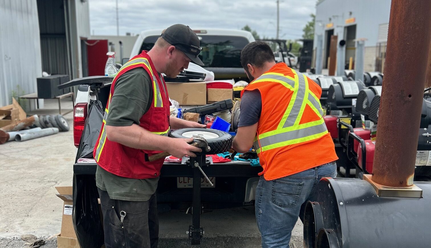 Certified technicians servicing industrial heating equipment, showcasing hands-on repair expertise and specialized tools